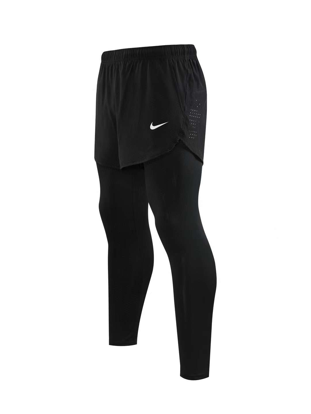 NIKE SHORTS WITH INBUILT LONG TIGHTS.